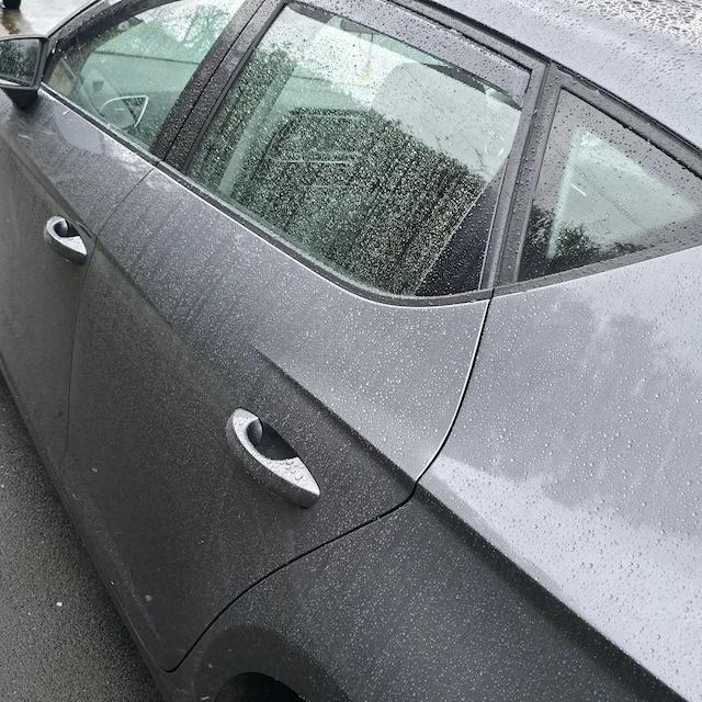 Protected bodywork showing water behaviour after detailing